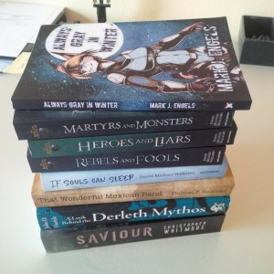 Stack of books written by members of the Allied Authors of Wisconsin